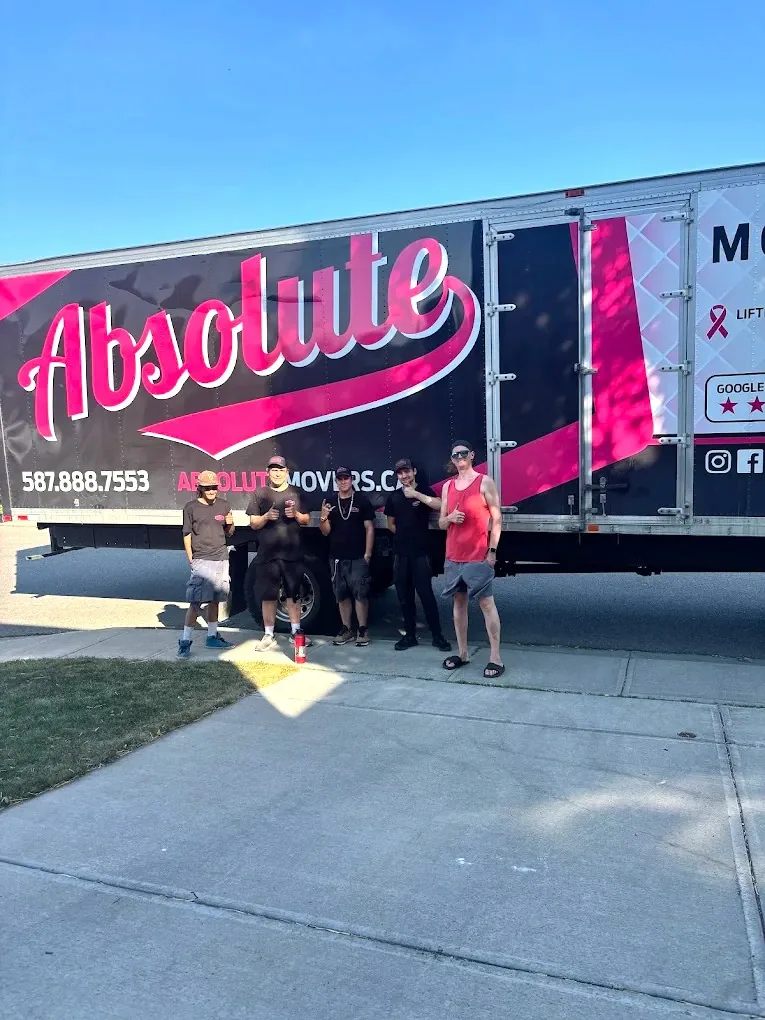 The Absolute Moving crew in front of their truck
